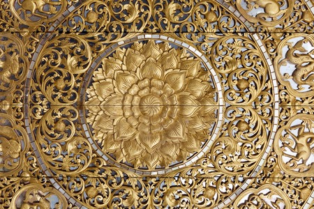 Wooden Thai style carving art at the templeの写真素材