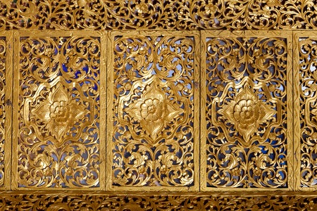 Wooden Thai style carving art at the templeの写真素材