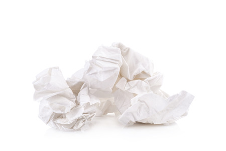 used screwed paper tissue isolated on white backgroundの写真素材