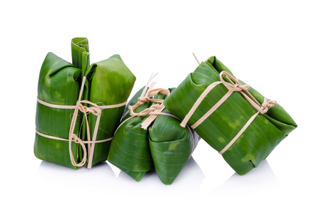 Sticky rice wrapped in banana Thai appetizerの写真素材