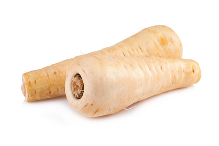 Fresh parsnip roots on a white backgroundの写真素材