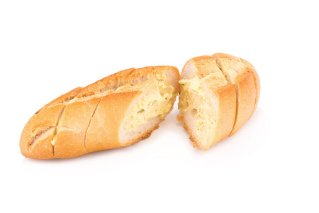 garlic bread against white background.の写真素材