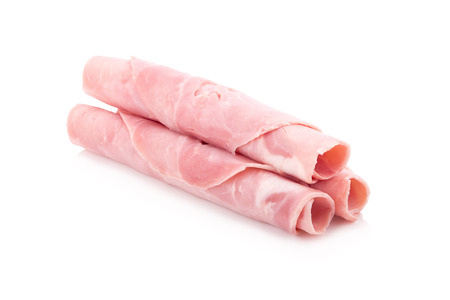 ham slices isolated on white.の写真素材