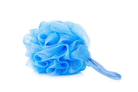 Blue plastic bath puff isolated on white background.の写真素材