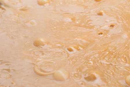 Thai dessert made from glutinous flour mixed with coconut milk and sugar which are boiled together.