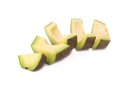 Avocado slices isolated on a white background.の写真素材
