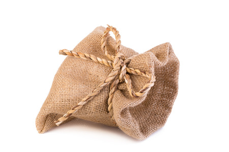 Open small sack isolated on white background.の写真素材