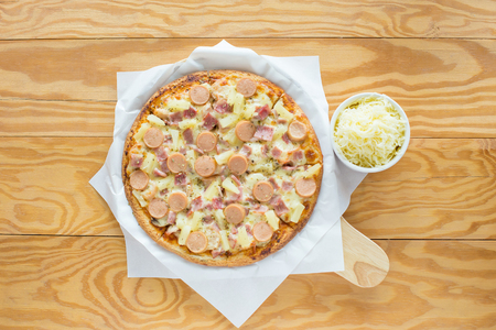 Ham and pineapple hawaiian pizza.の写真素材