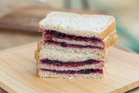 sliced bread and Blueberry jam.