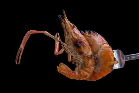 Burn shrim and Seafood sauce on black backgroundの写真素材
