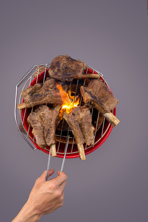 Roast short pork ribs  whith gas burner flame burnsの写真素材