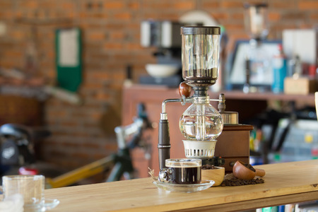 close up of siphon vacuum coffee maker at shopの写真素材