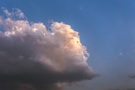Colorful dramatic sky with cloud at sunset.Sky with sun backgroundの写真素材