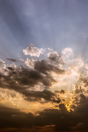 Colorful dramatic sky with cloud at sunset.Sky with sun backgroundの写真素材