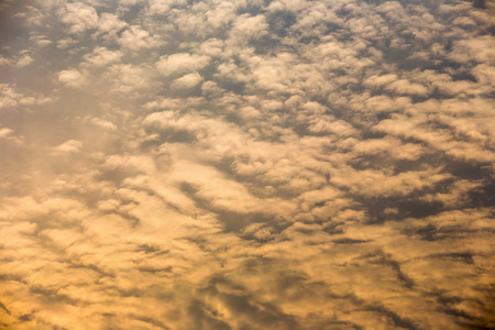 Colorful dramatic sky with cloud at sunset.Sky with sun background.