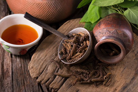 East Indian screw tree and Tea ,Thai herb for health on wooden background.の写真素材