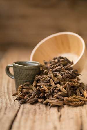 East Indian screw tree and Tea ,Thai herb for health on wooden background.の写真素材