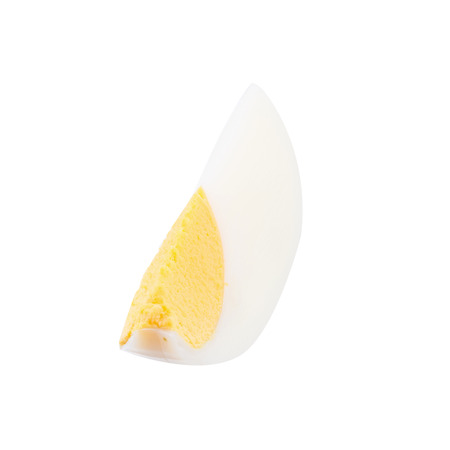 Boiled egg split on a white background.の写真素材