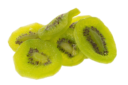 Dried kiwi fruit, dried preserved candied kiwifruit slices sugary sweet snack isolated on white background.の写真素材