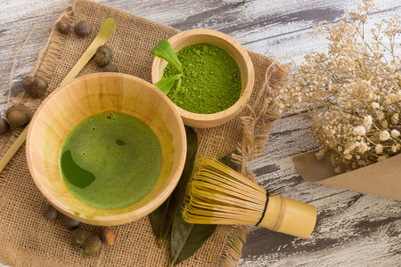 Set of matcha powder bowl, wooden spoon and whisk, green tea leaf, Organic Green Matcha Tea ceremony.の写真素材