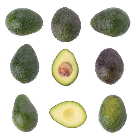 Green ripe avocado isolated on the white background.