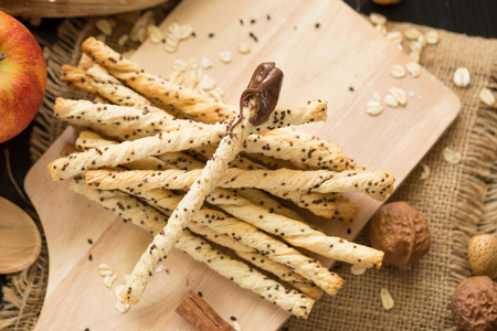 cinnamon bread Crispy twist pies. with a chocolate butter and red apple.の写真素材