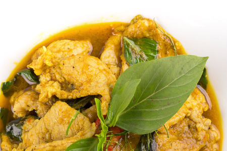 Fried pork with Chilli Curry, Thai spicy Food isolated on white background.の写真素材