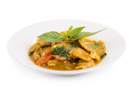 Fried pork with Chilli Curry, Thai spicy Food isolated on white background.の写真素材