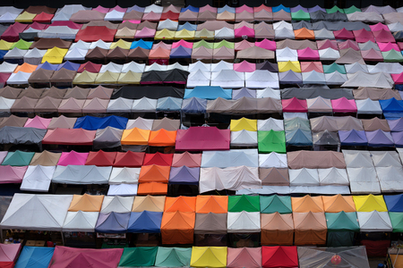 Colorful food stalls at Rod Fai Night Market in Bangkokの写真素材