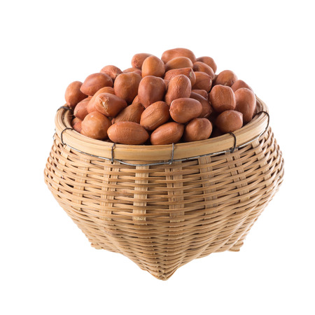 Raw peanuts isolated on a white background.の写真素材
