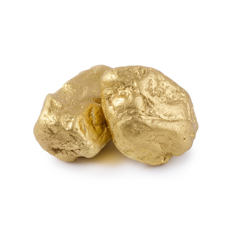 Gold nugget grains isolated on a white background.の写真素材