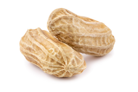 Dried peanuts isolated on a white background.