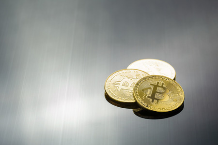 Gold bitcoin physical Bitcoin-Cryptocurrency. Business concept.の写真素材