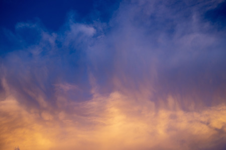 Colorful dramatic sky with cloud at sunset.