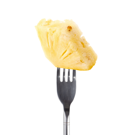 Pineapple Sliced on a Silver Fork isolated on white background.の写真素材
