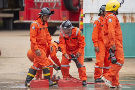 2018 Aug 7, Lampang, Thailand, Firefighters training, Disaster training exercise depicting gas station.のeditorial素材