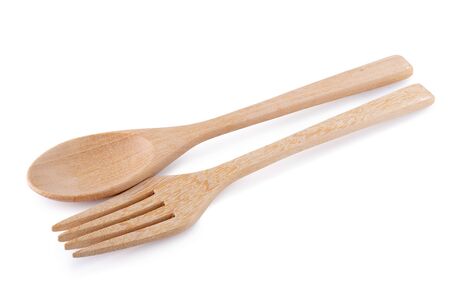 Wooden spoon and wooden fork isolated over white backgroundの写真素材