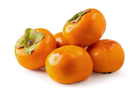 Fresh ripe persimmons isolated on white backgroundの写真素材
