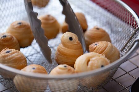 Preparation of Puff pastry dough for the Fried Chinese pastry.