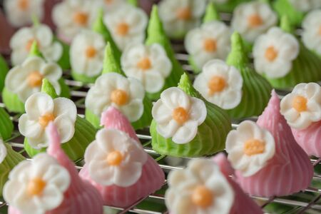 Hands women make Aalaw or Alua, Thai traditional candy sweet dessert.の写真素材