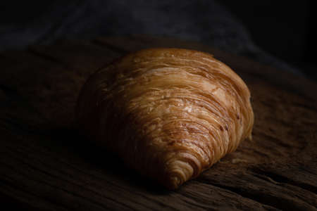 Plain butter croissant crescent pastries, Freshly baked croissants. Warm Fresh Buttery Croissants on a tray.の写真素材
