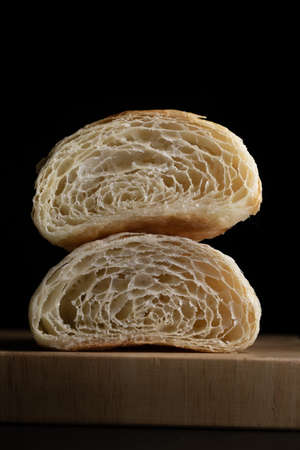 Plain butter croissant crescent pastries, Freshly baked croissants. Warm Fresh Buttery Croissants on a tray.の写真素材