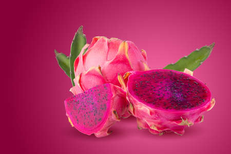 Ripe pitahaya fruit or dragon fruit with half isolated on red background