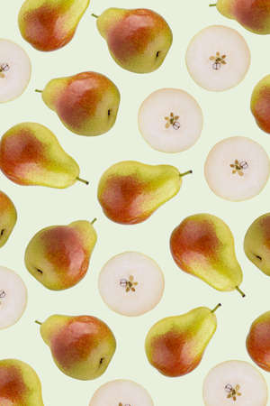 Green Pears isolated on a blue wallpaper backgroundの写真素材