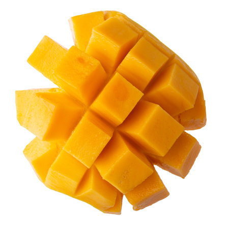 Mango cubes and mango slices isolated on a white backgroundの写真素材