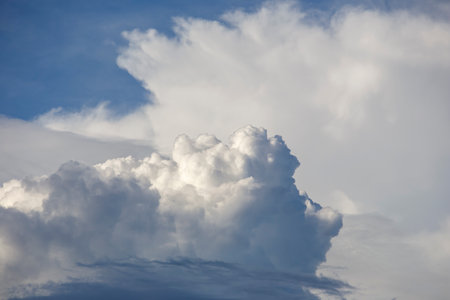 White clouds form in the blue sky.の写真素材