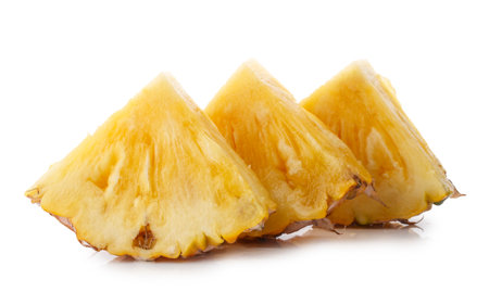 slices pineapple isolated on a white backgroundの写真素材