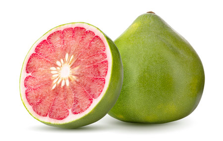 whole and half cut grapefruit isolated on a white backgroundの写真素材