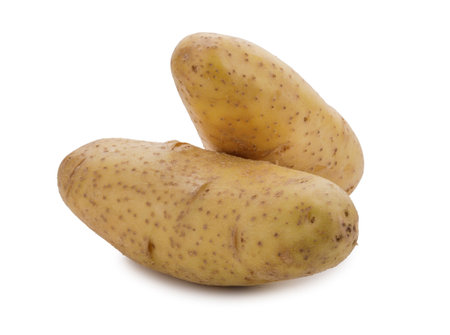Whole potatoes isolated on a white backgroundの写真素材