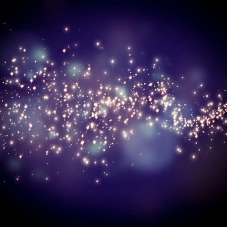 glittering stars on bokeh background の写真素材